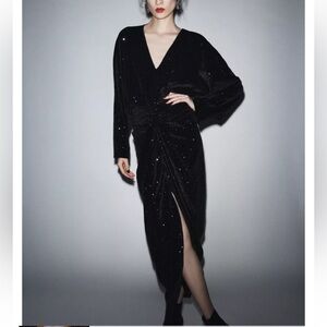 Zara Brand New Dress Size L

Elegant Black Sequin Long-Sleeve Midi Dress